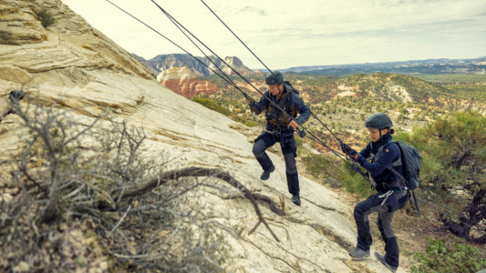 National Geographic Escalante Desert Plateau - Bear Grylls and Natalie Portman in RUNNING WILD WITH BEAR GRYLLS: THE CHALLENGE. (Credit: National Geographic/Ben Simms)